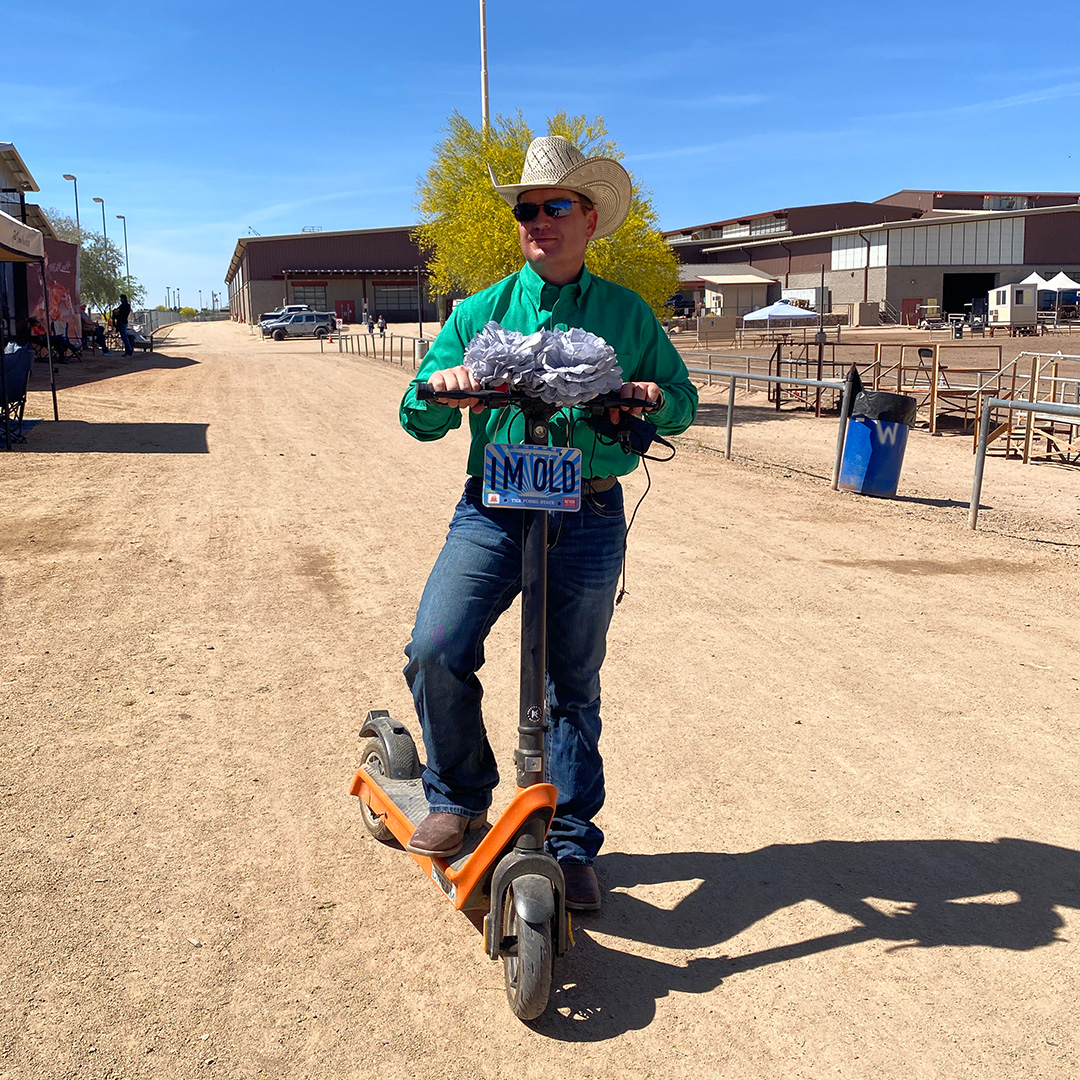 preston kent at the cactus reining classic on scooter